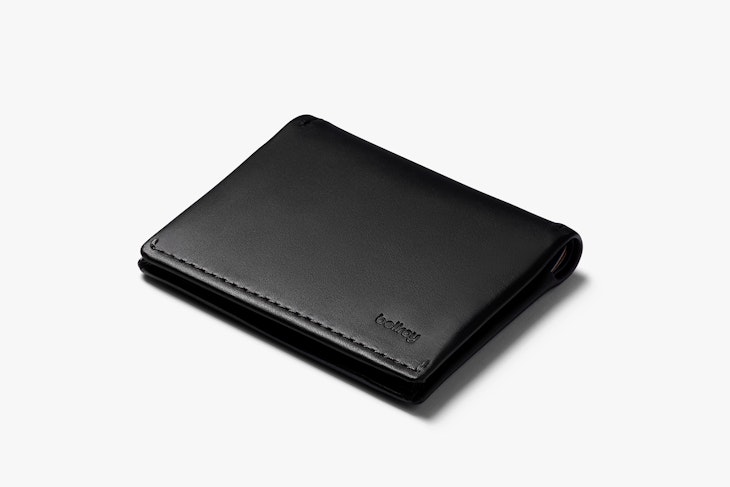 a Premium lightweight leather pocket-friendly wallet with 2 quick access card slots is the best gift for your papa